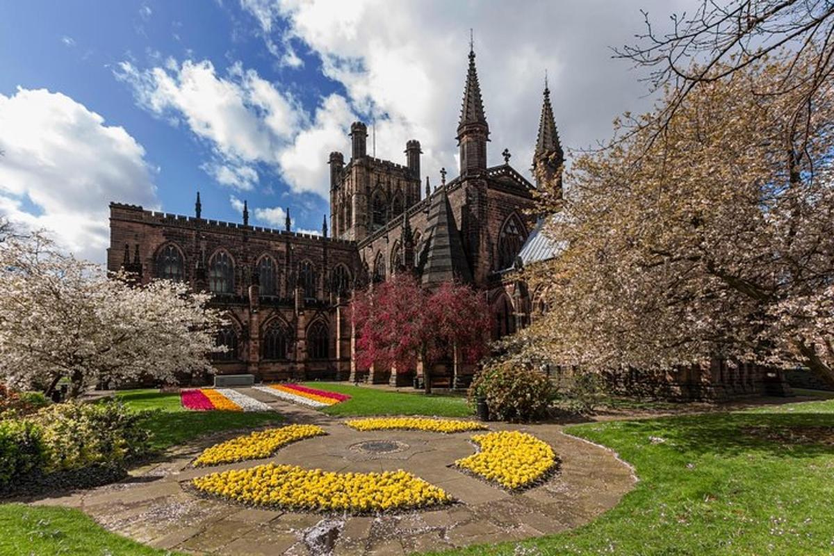 a large building with a clock in front of it