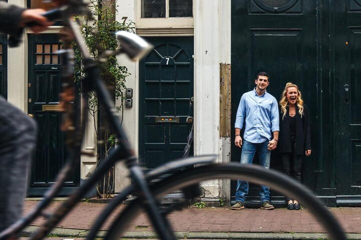 a man and woman standing in front of green doors