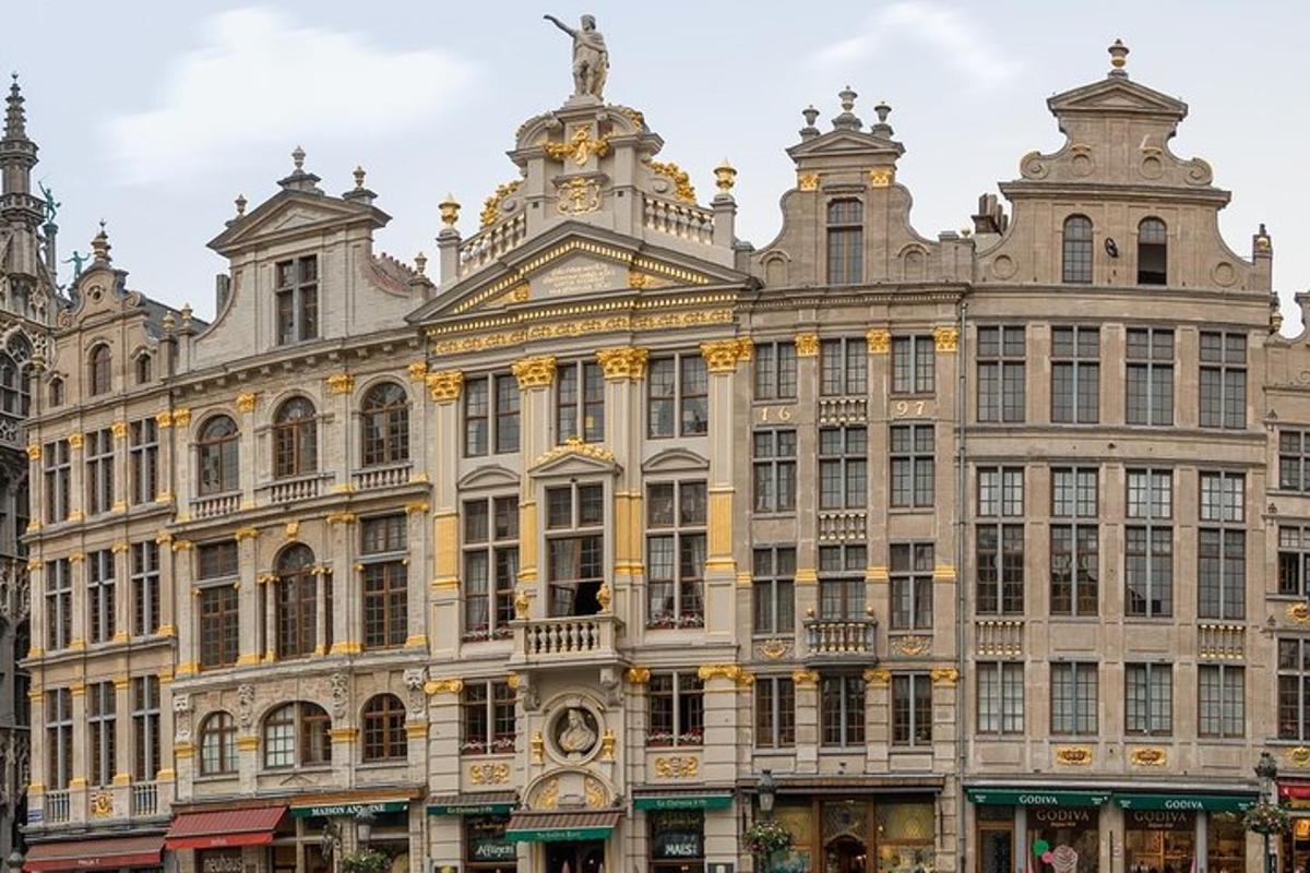 a large building with a statue on top of it