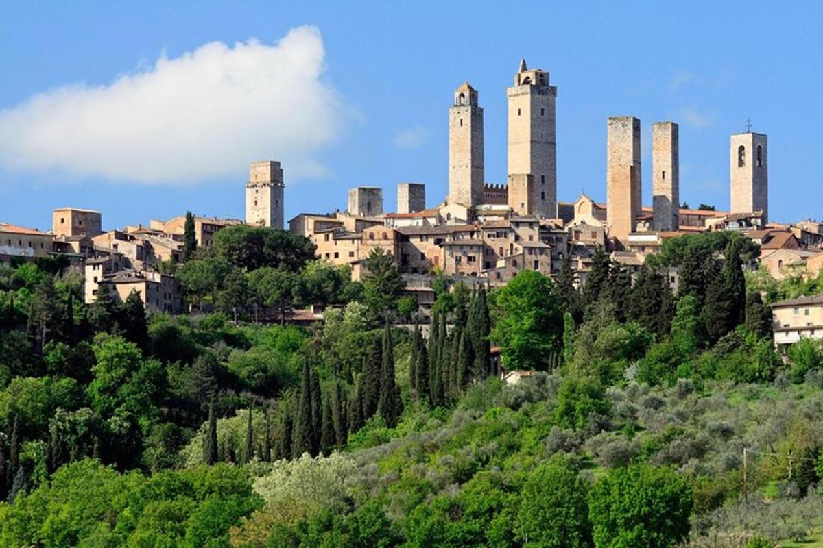 a city on top of a hill with a factory