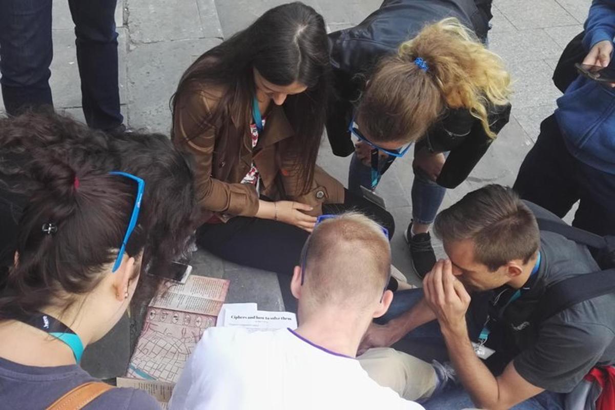a group of people sitting on the ground