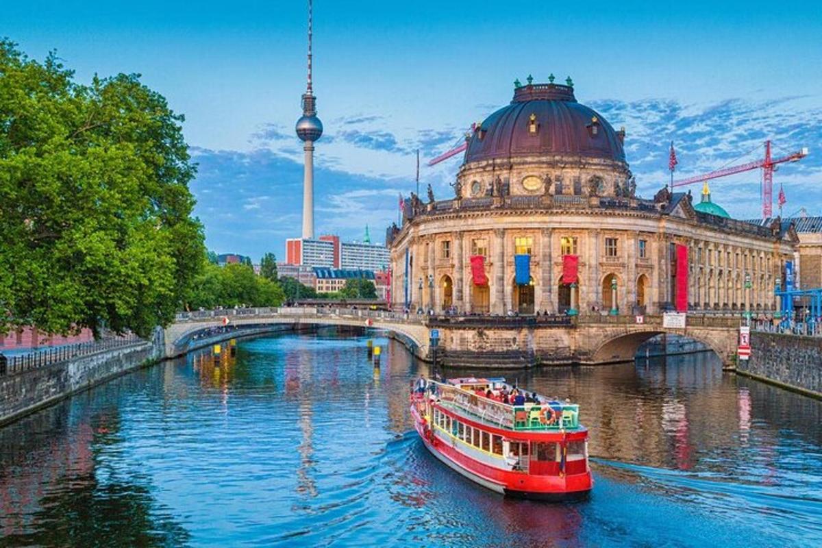 a boat in a river in front of a building