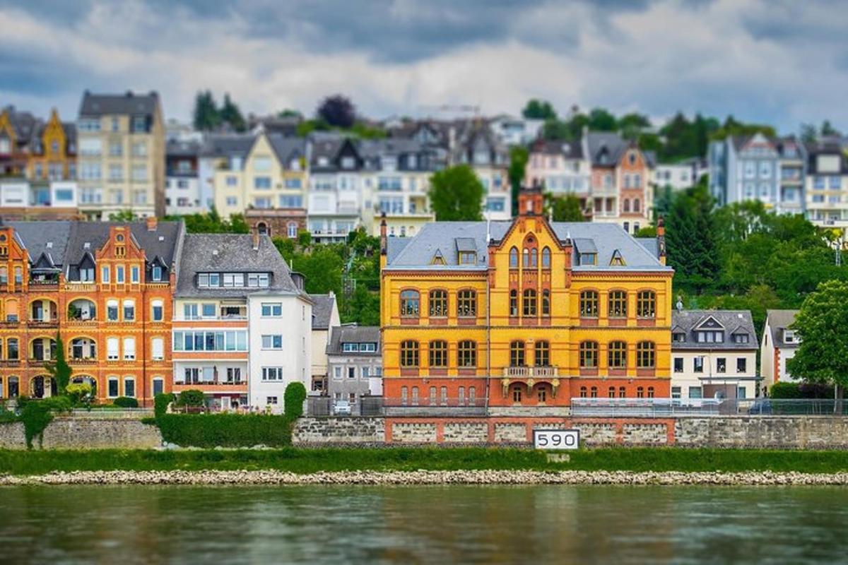 a group of buildings next to a body of water