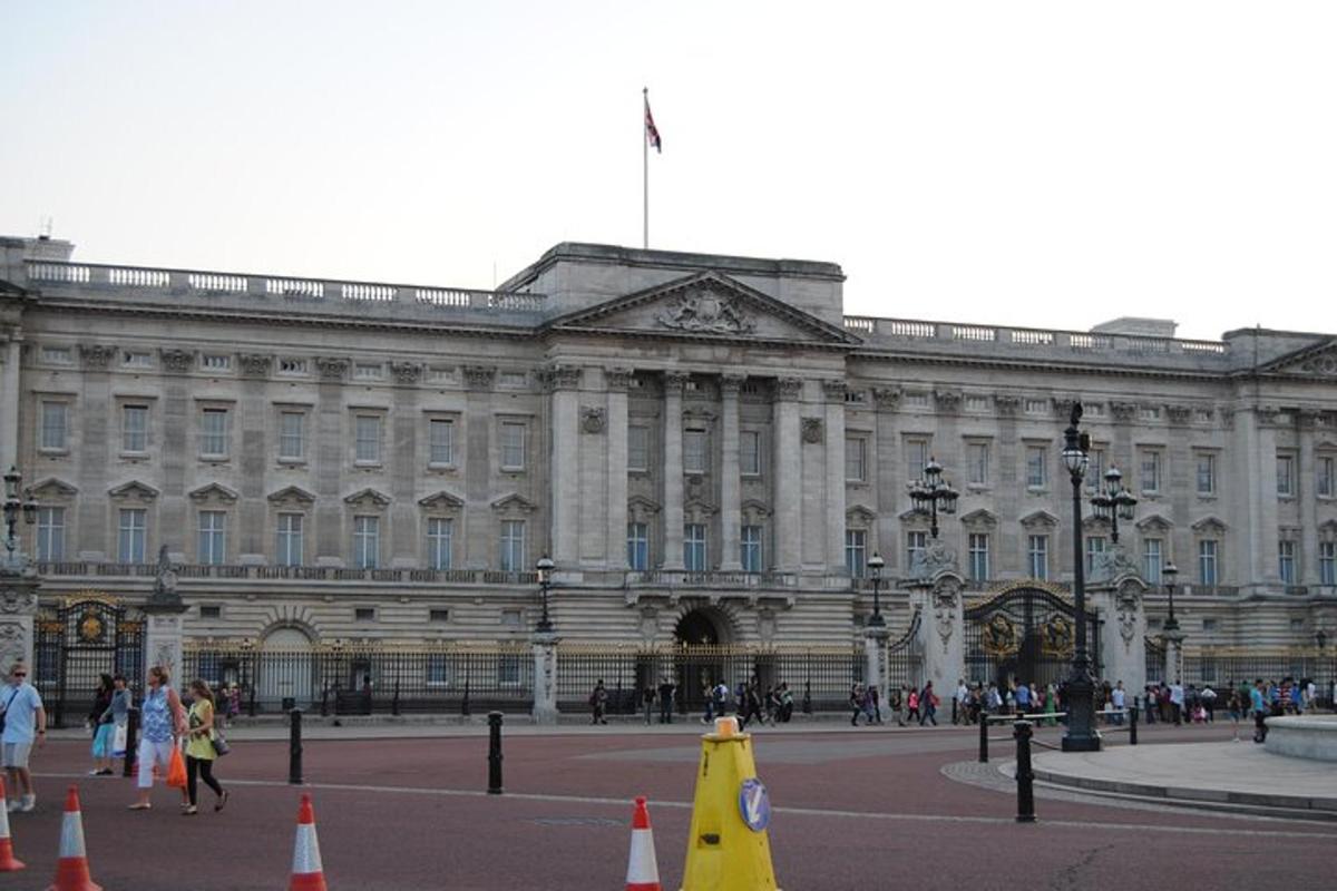 a large building with orange cones in front of it