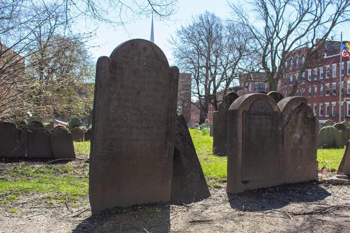 a group of gravestones in a cemetery