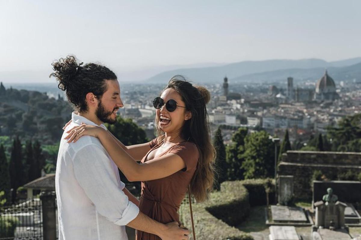 a man and a woman standing on top of a city