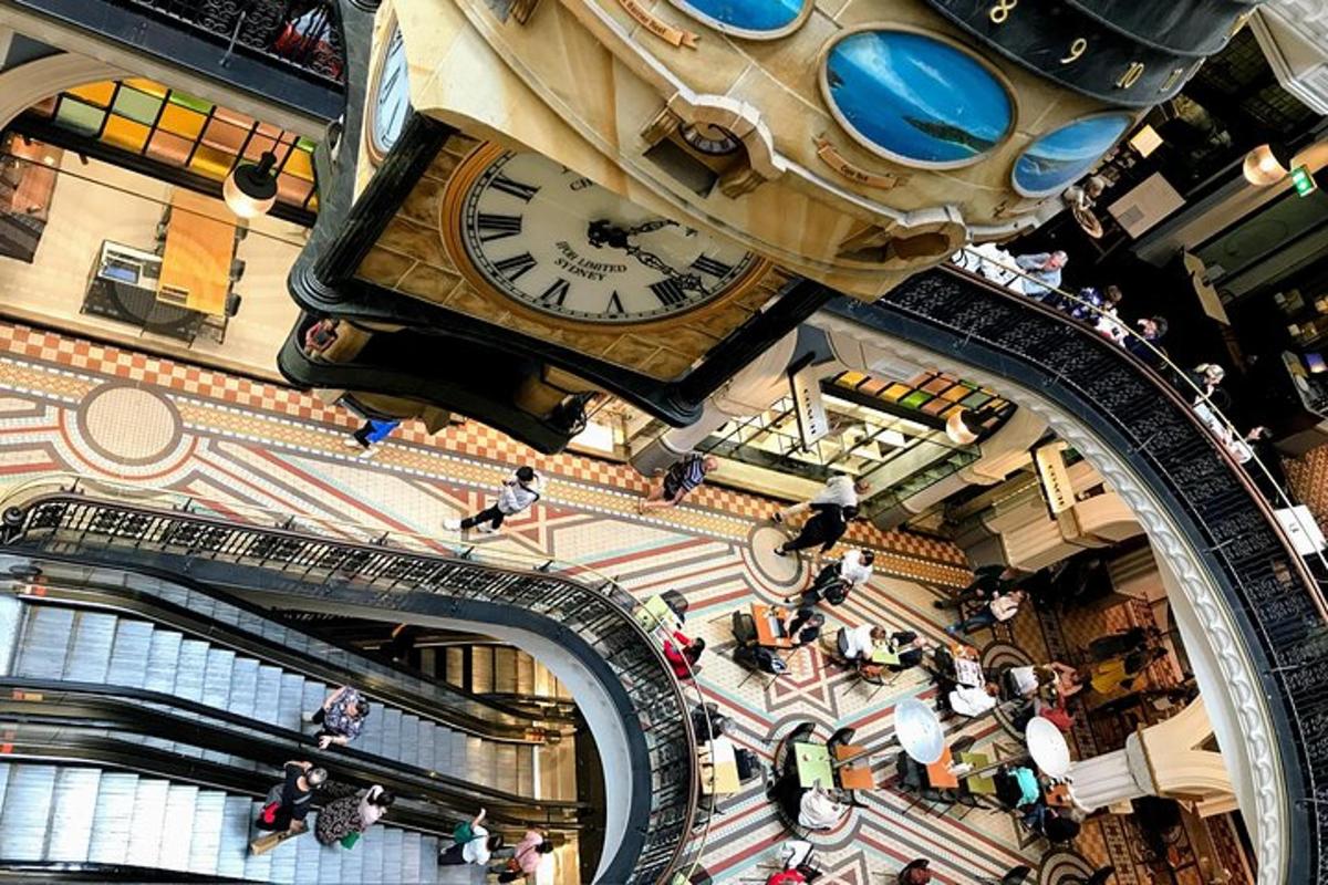 an overhead view of a clock in a shopping mall