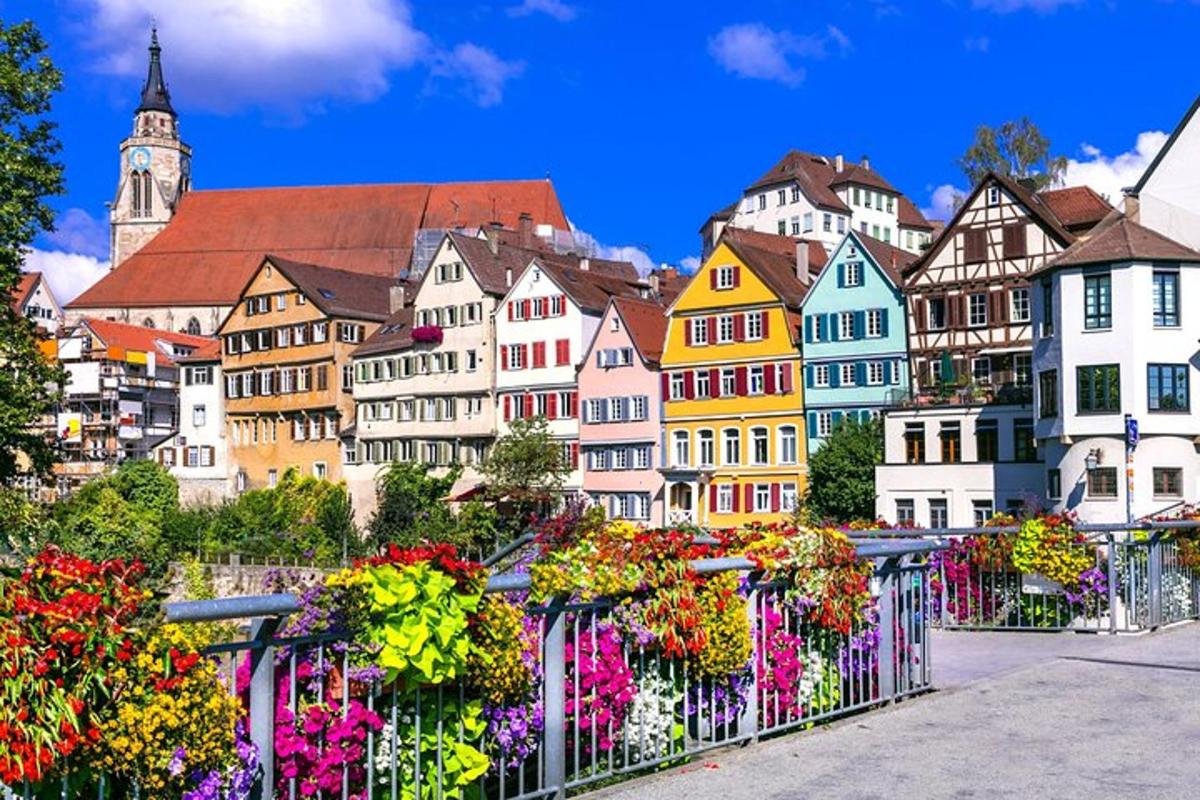 a city with colorful buildings and a fence with flowers