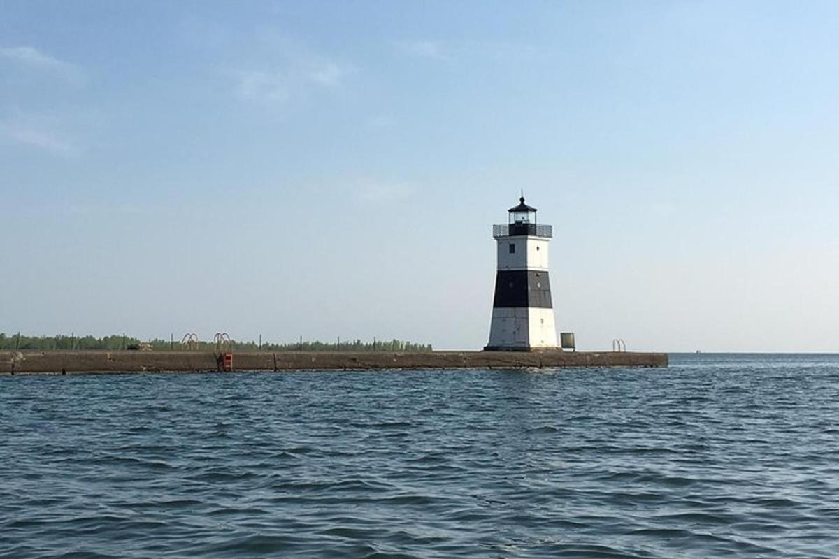 a lighthouse on a island in the water