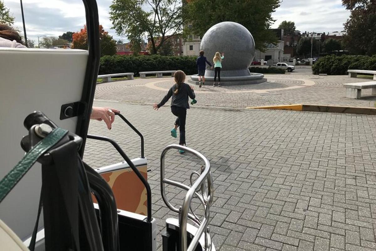 a woman is running on a boat in a park