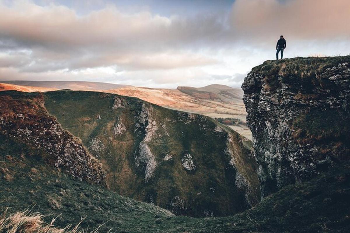 a man standing on top of a mountain