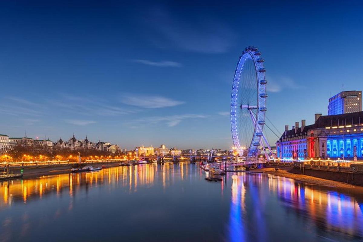una grande ruota panoramica in una città di notte