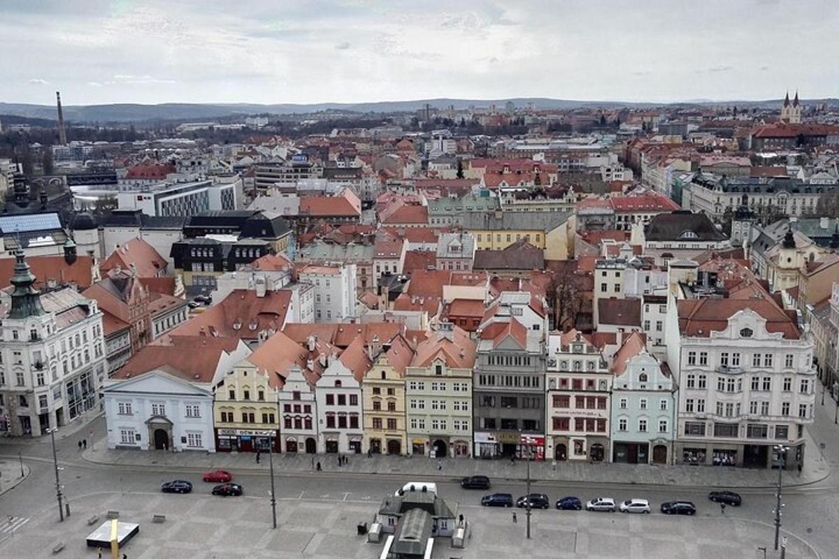 a view of a city with buildings and cars