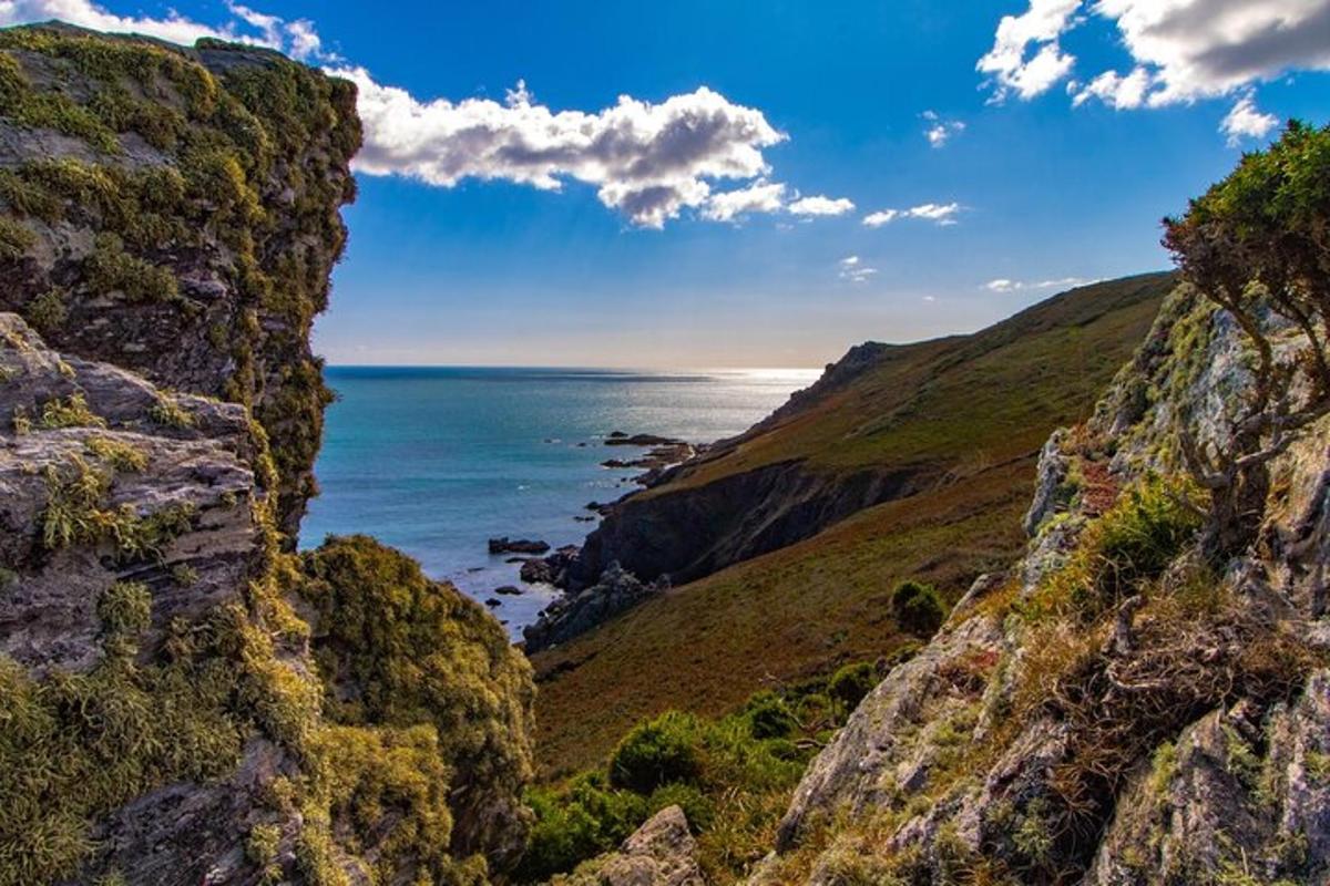 a view of the ocean from a rocky cliff