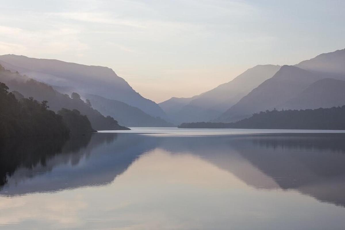 a view of a lake with mountains in the background
