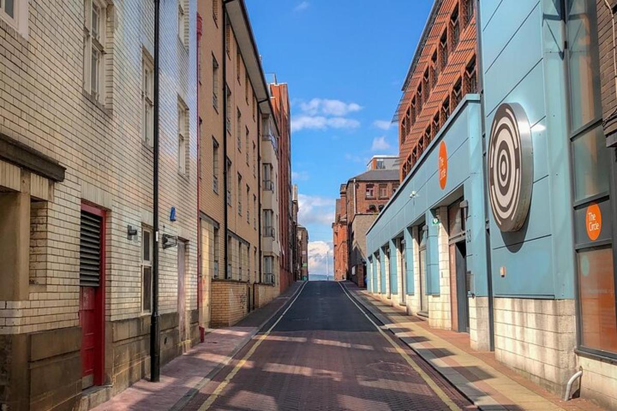 an empty street in an alley between buildings