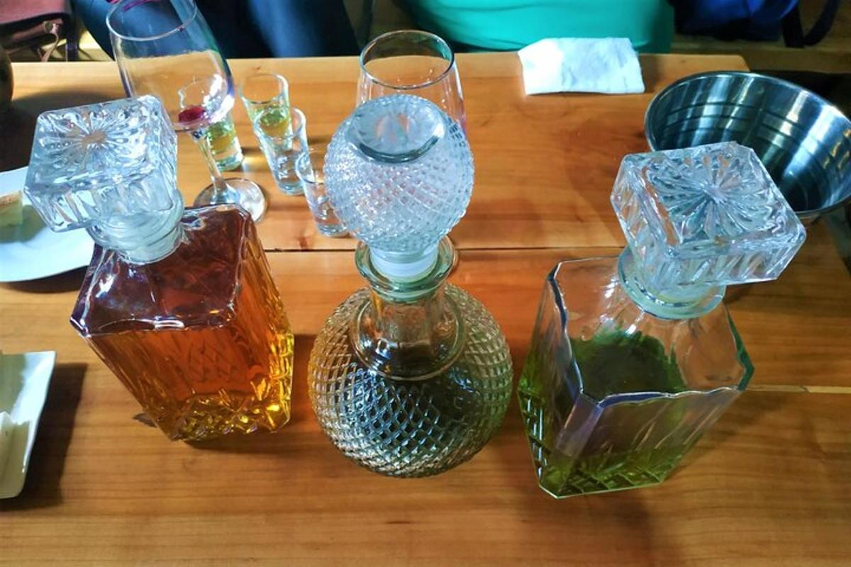 a table with three glass vases on a table