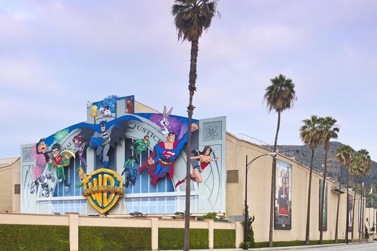 a building with a superhero mural on the side of it