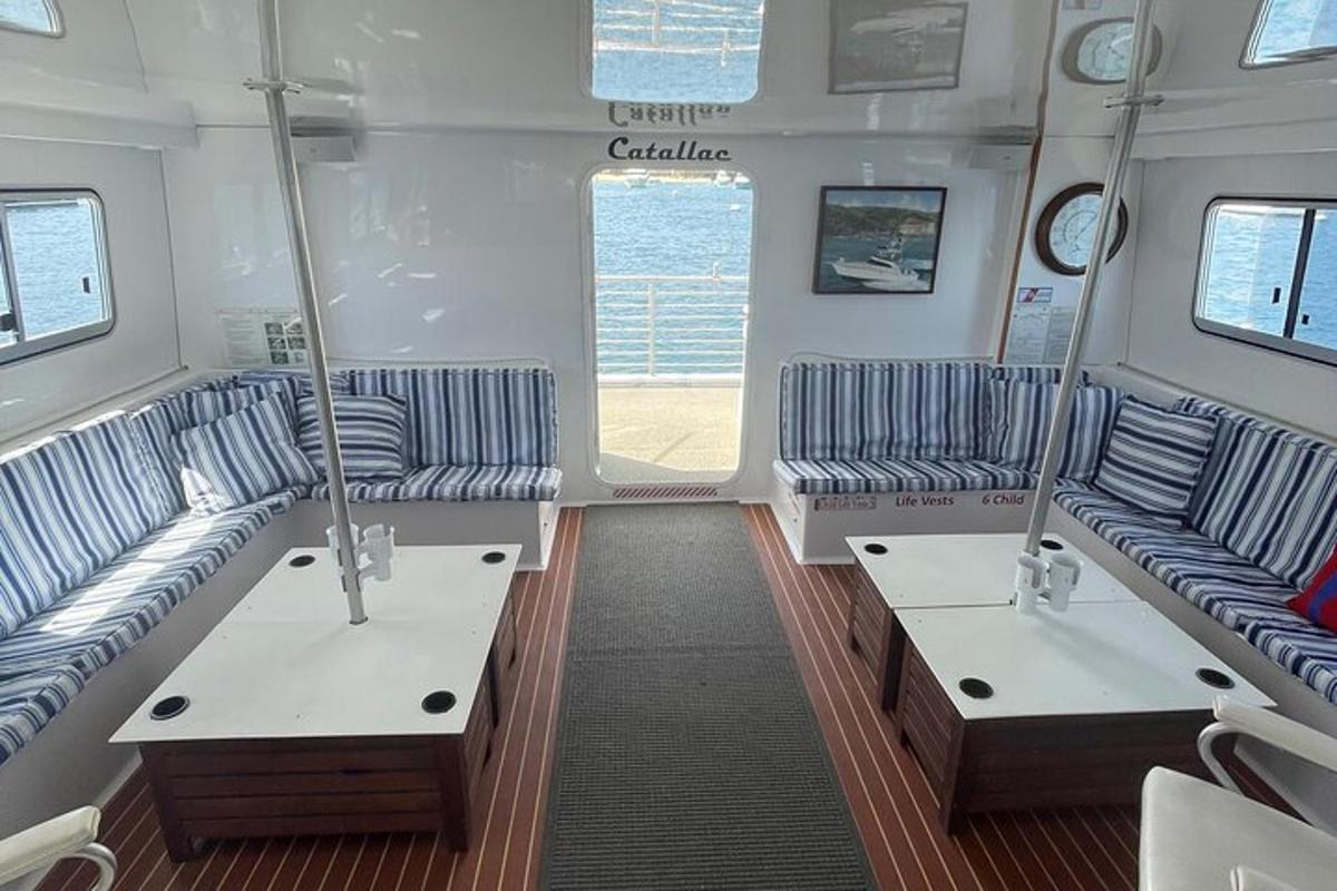 a room with two couches in a boat