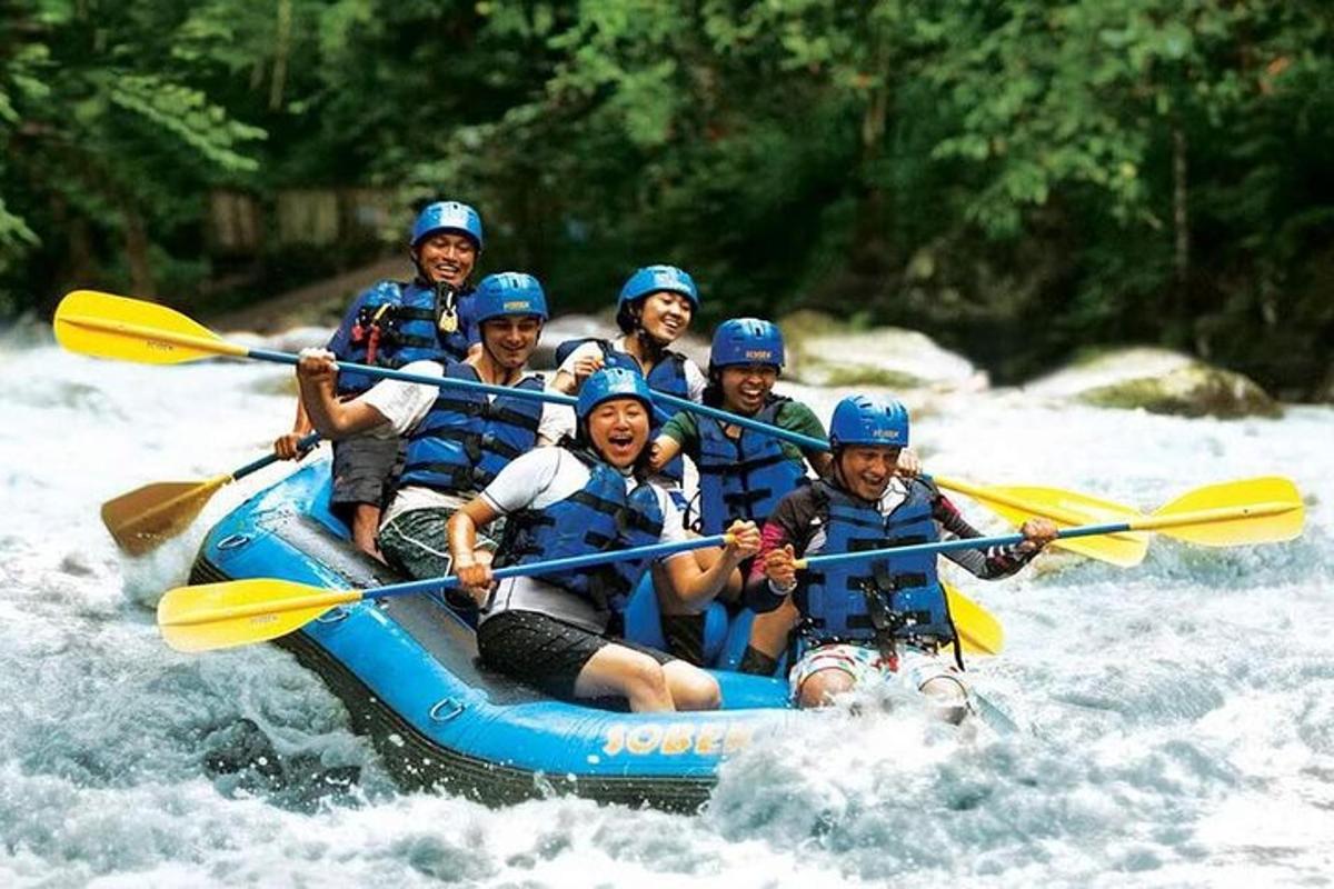 a group of people on a raft in the water