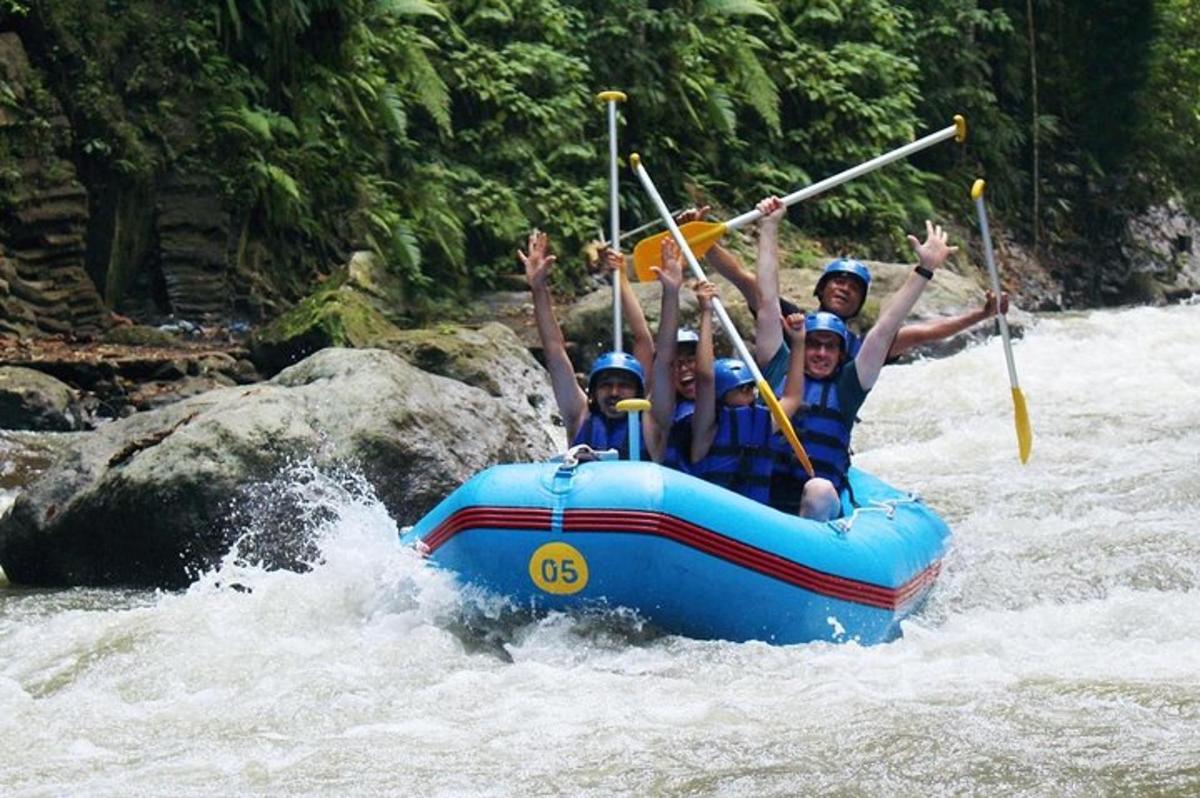 a group of people in a raft on a river