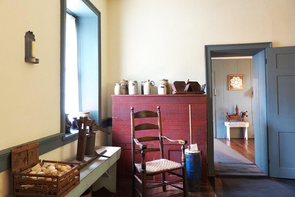 a room with a red cabinet and a chair