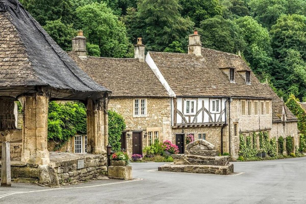 a group of old stone houses in a village