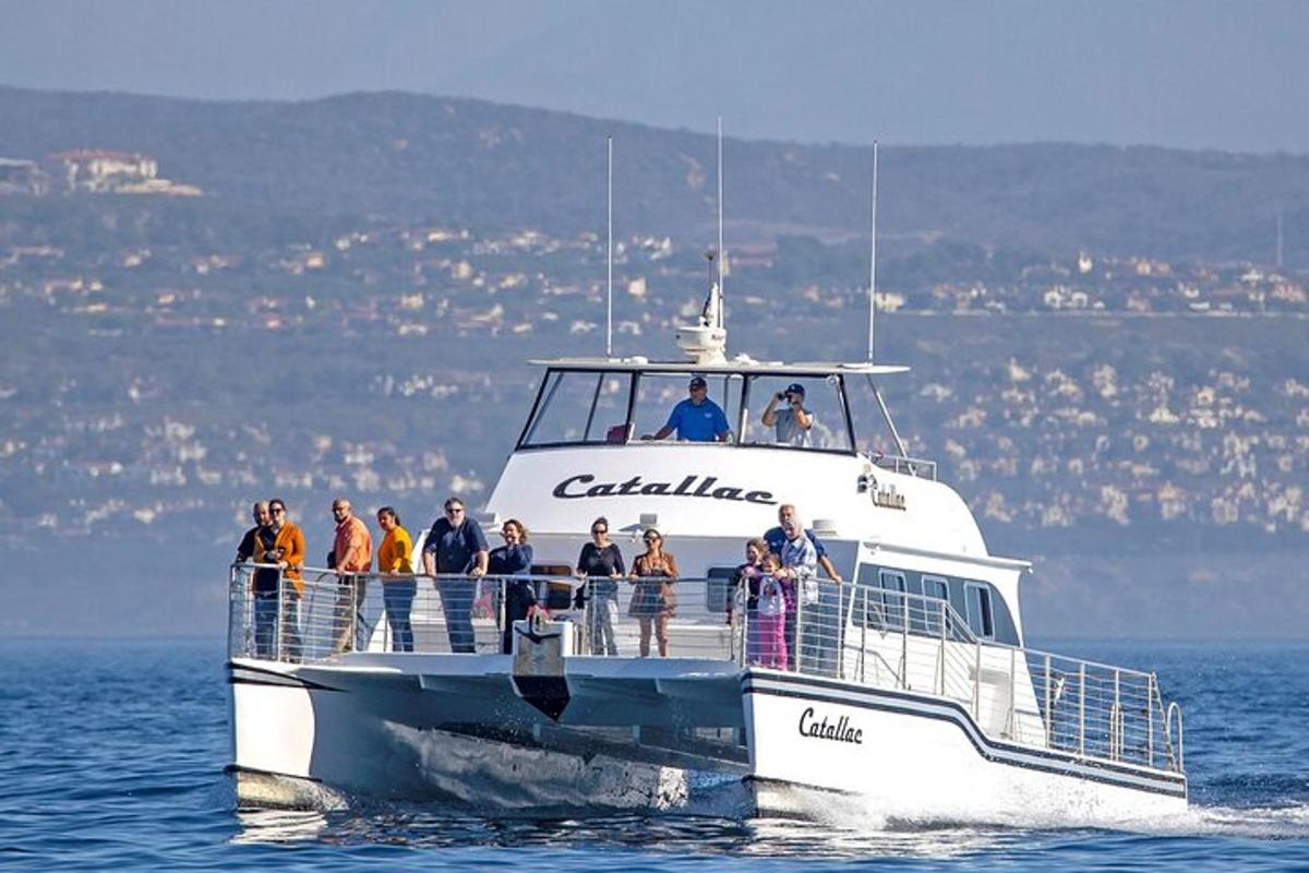 a group of people on a boat in the water