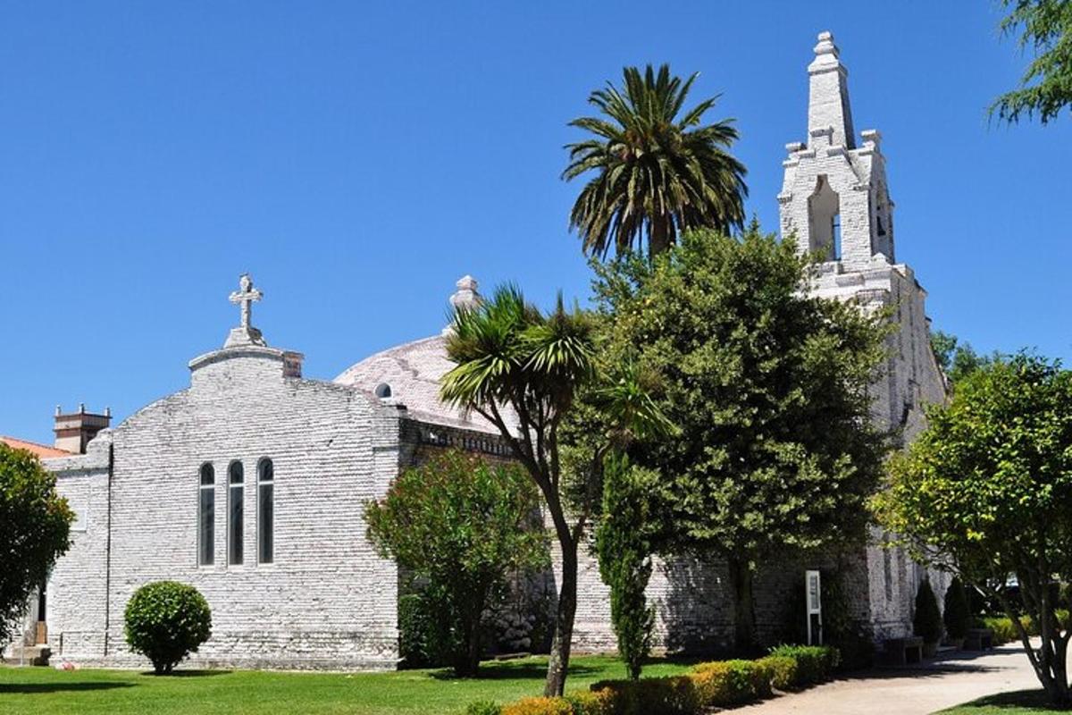 a church with a palm tree in front of it