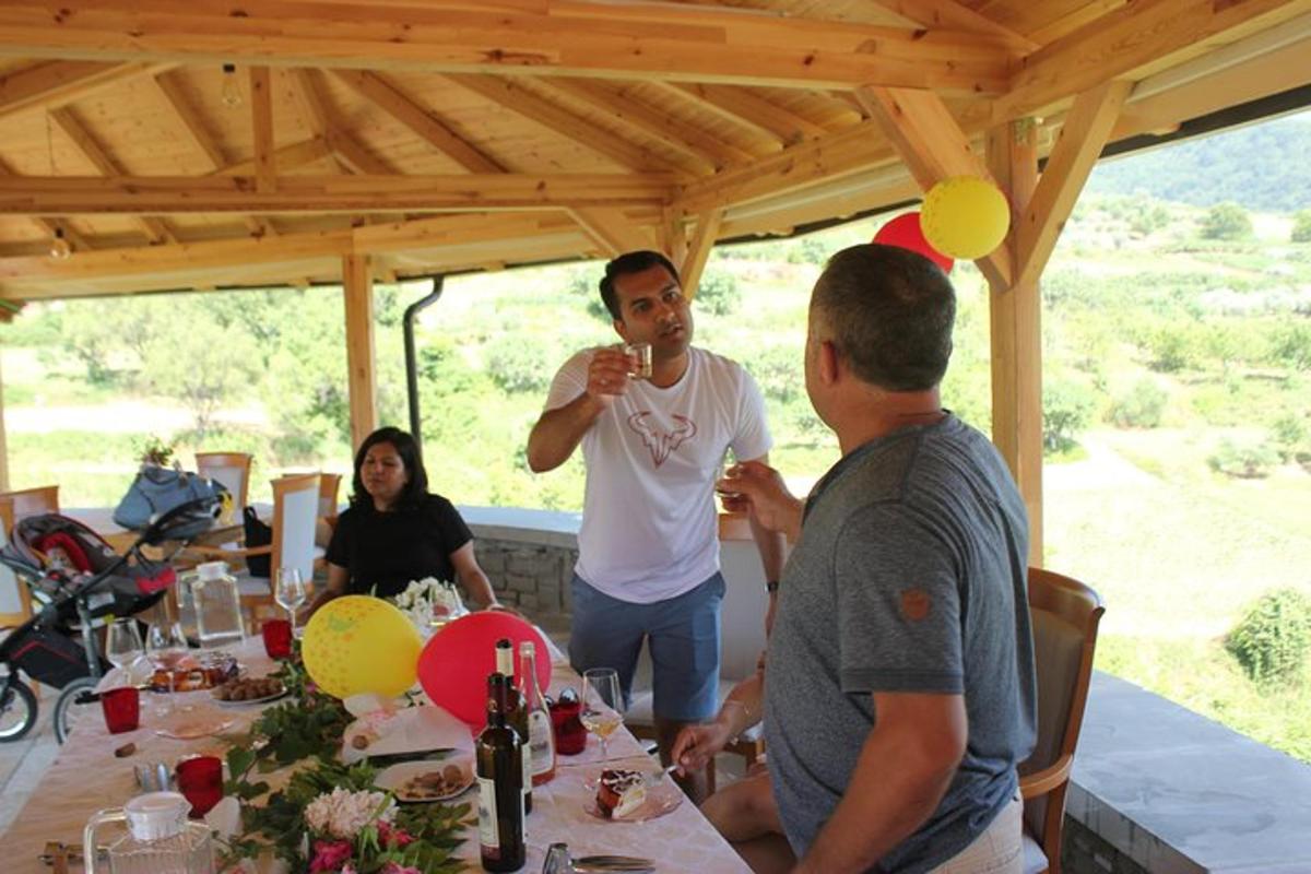 a group of people sitting at a table with drinks