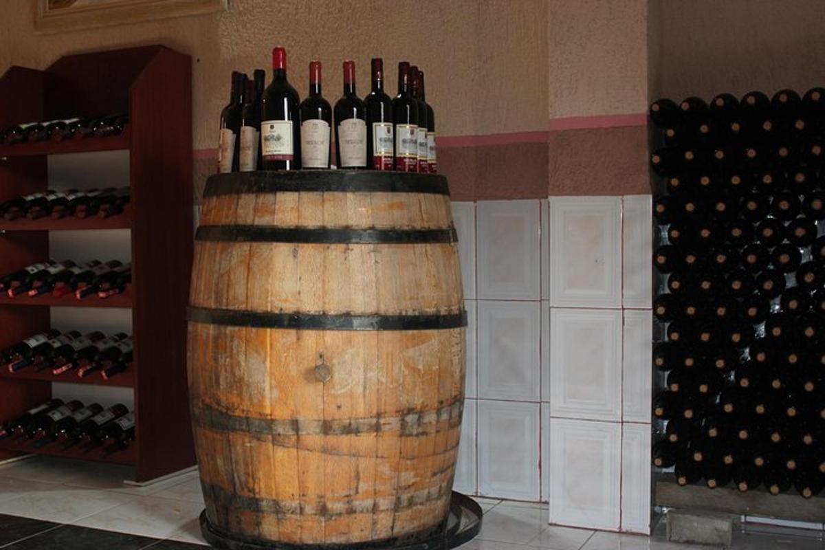 a bunch of bottles of wine in a wine cellar