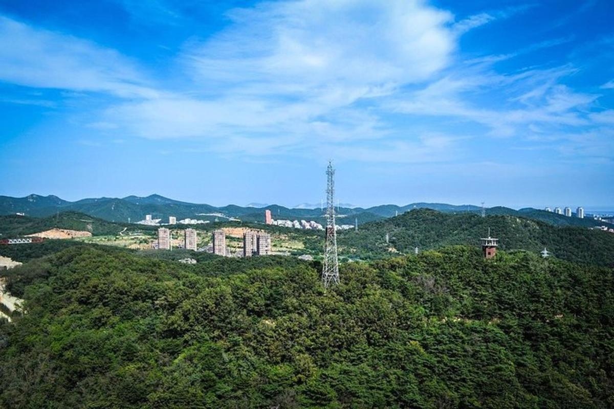 a cell phone tower on top of a hill