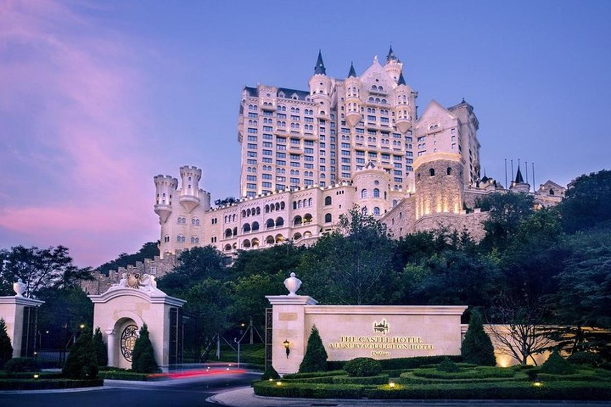 a large building sitting on top of a hill