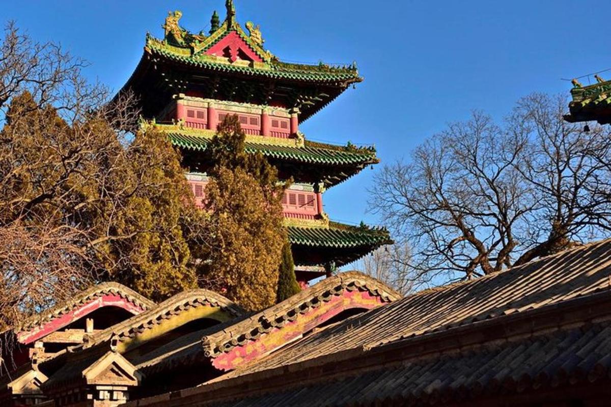 a large building with a tower on top of a building