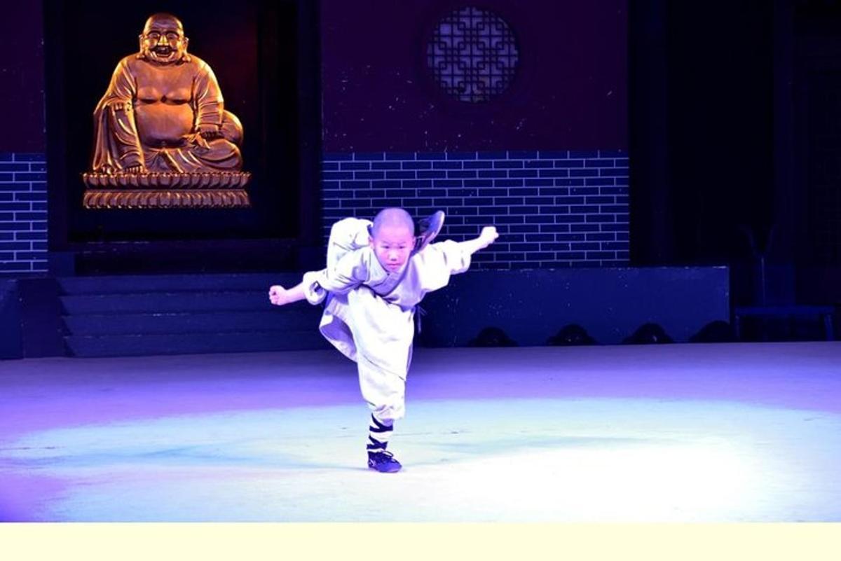 a young child dancing on the stage at a circus