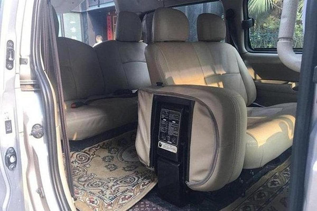 an open back seat of a car with the back seatservationangering