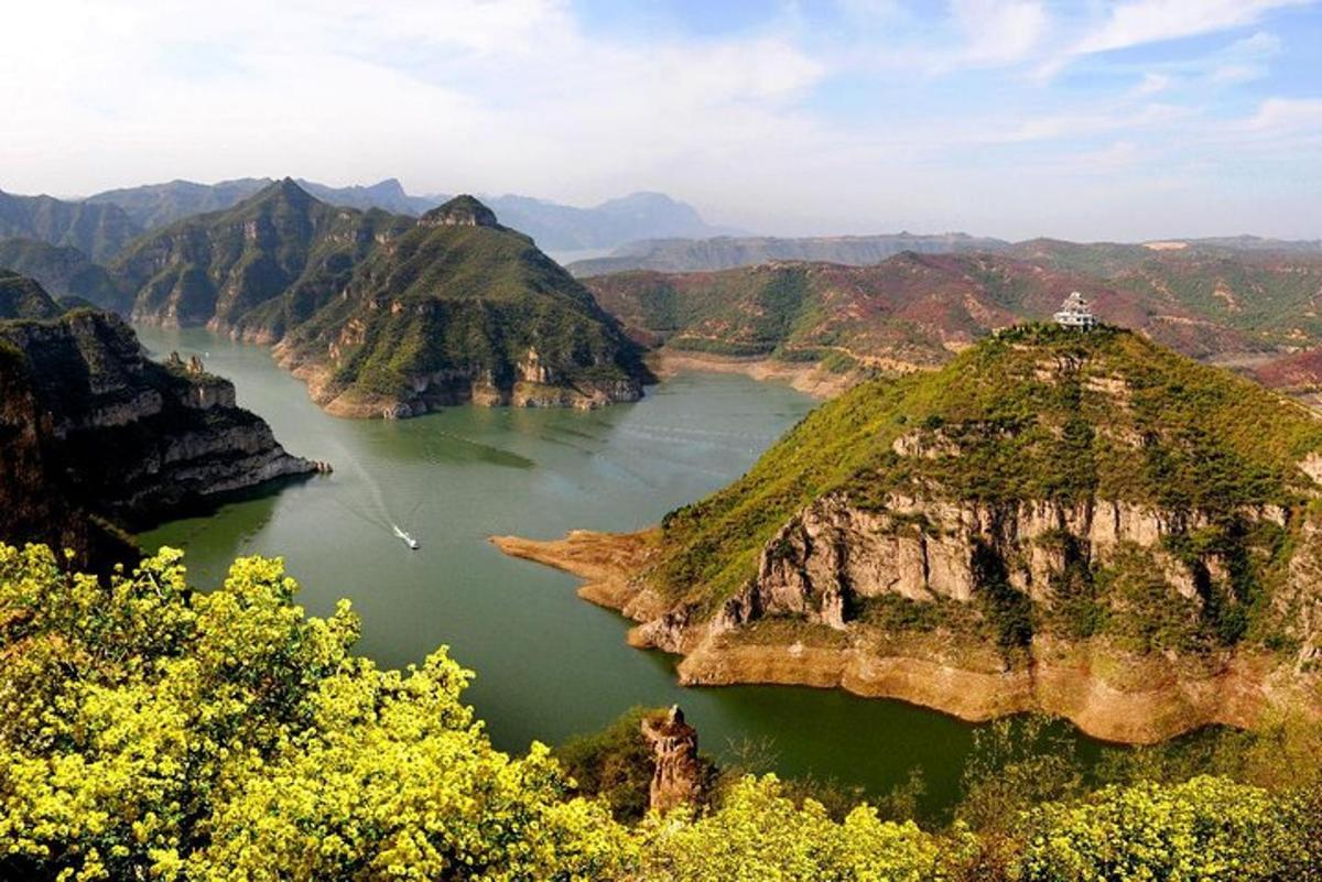 a river in the middle of a mountain range