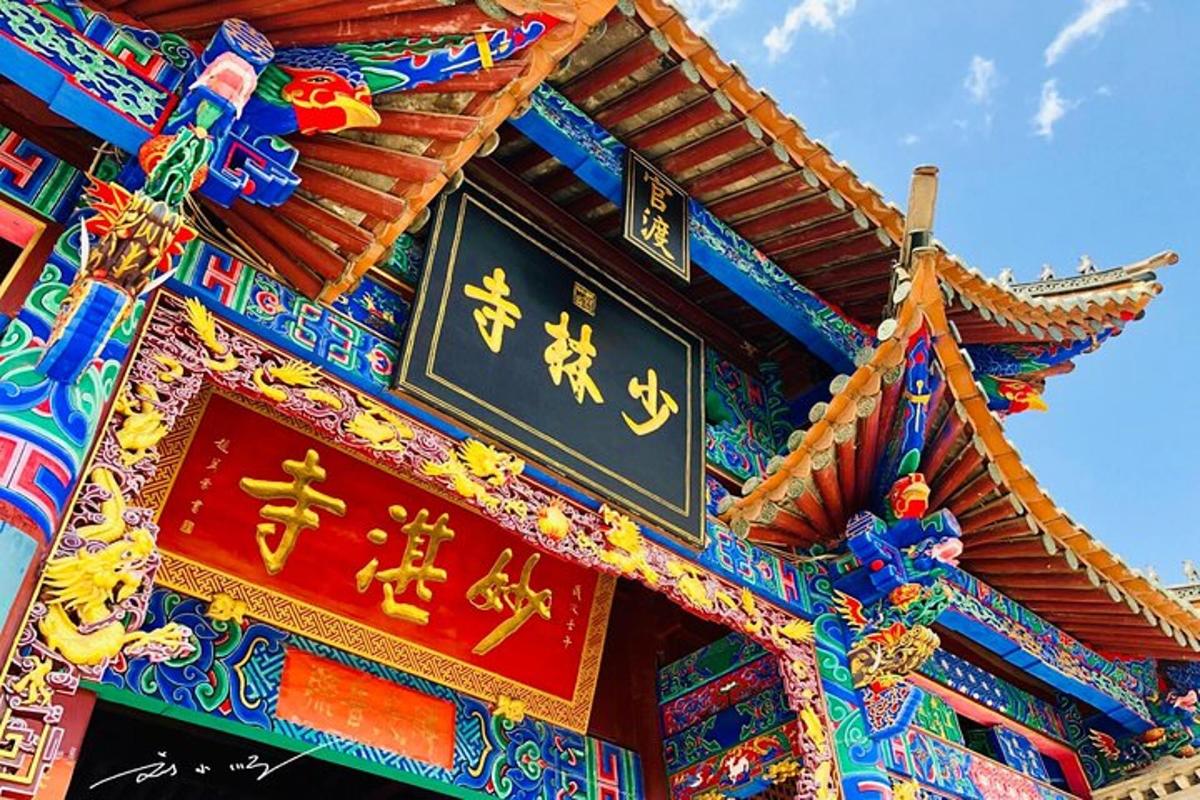 a building with chinese signs on the side of it