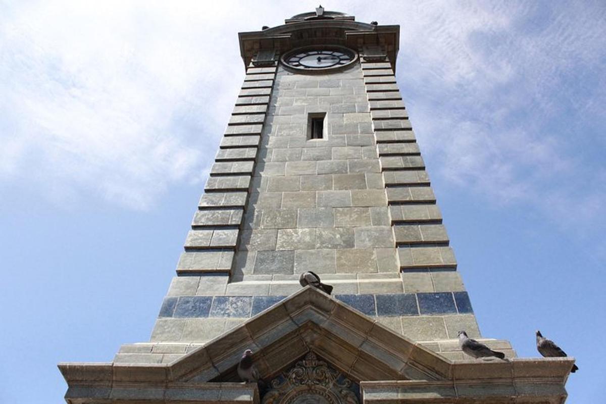 a tall tower with a clock on top of it