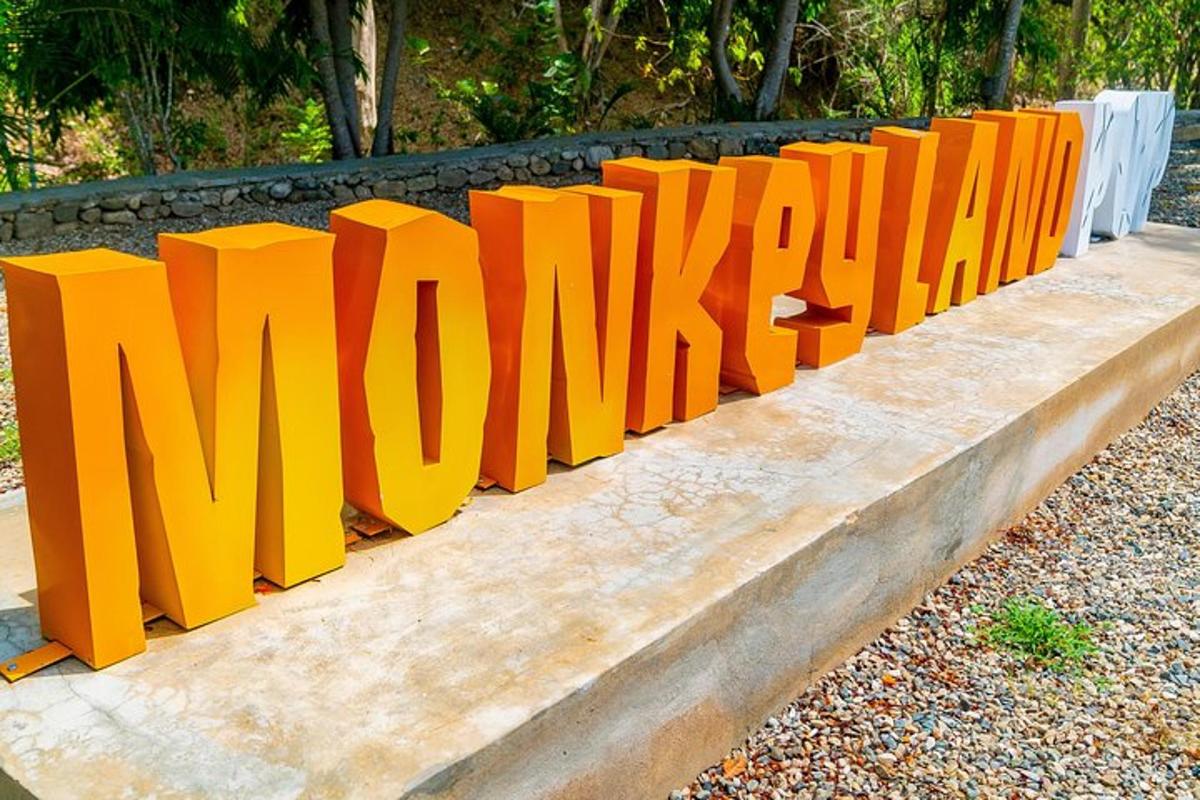 a large orange sign that reads miami