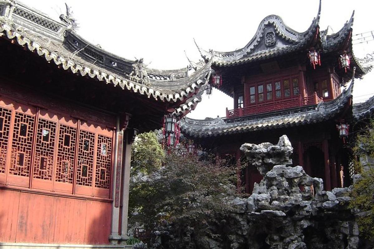 an asian building with a building with a lion on it
