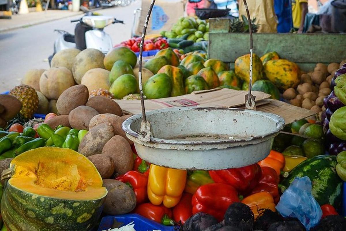 a display of fruits and vegetables in a market