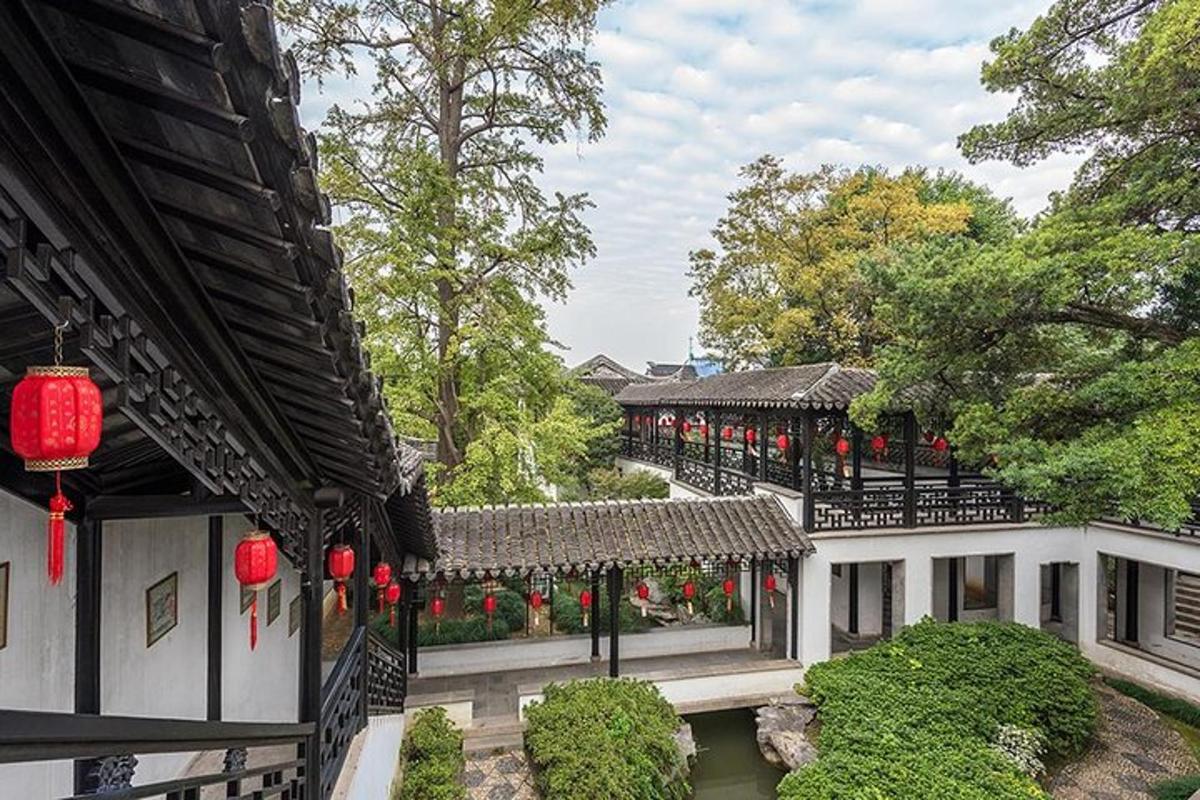 a building with red lanterns on the side of it