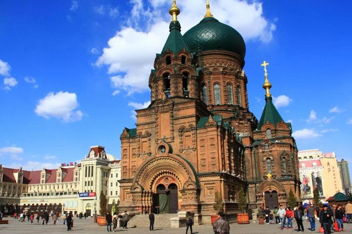 a church with a tower with a cross on it