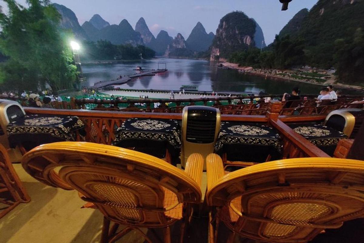 a boat with chairs and a view of a river