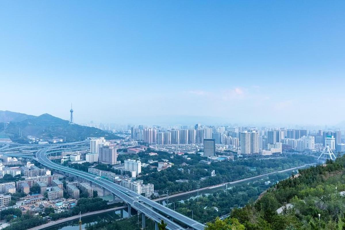 a view of a city with a highway and buildings
