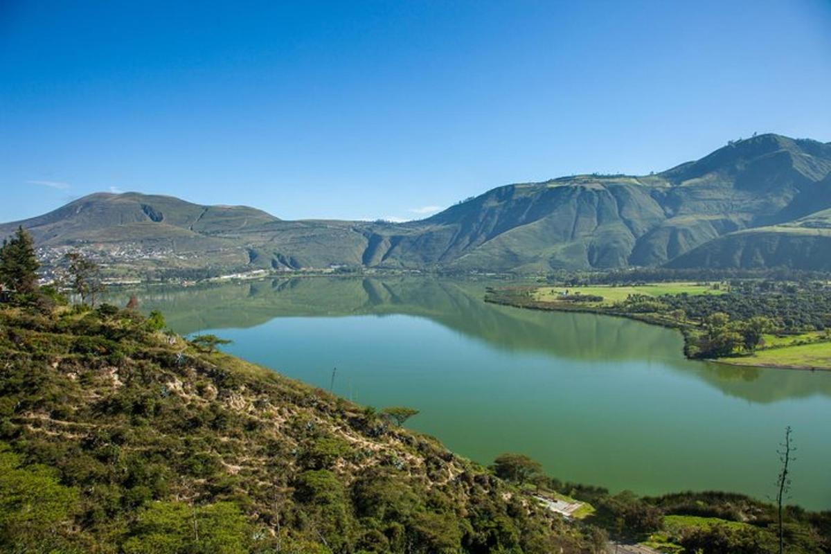 a view of a lake with mountains in the background