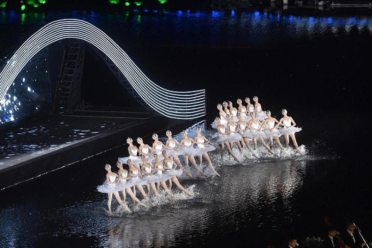 a group of people sitting on chairs in the water