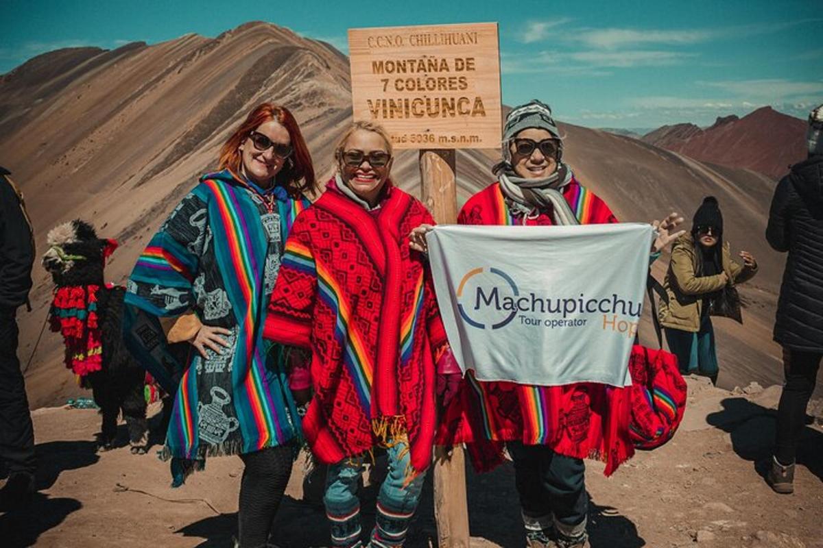 a group of people standing in front of a sign