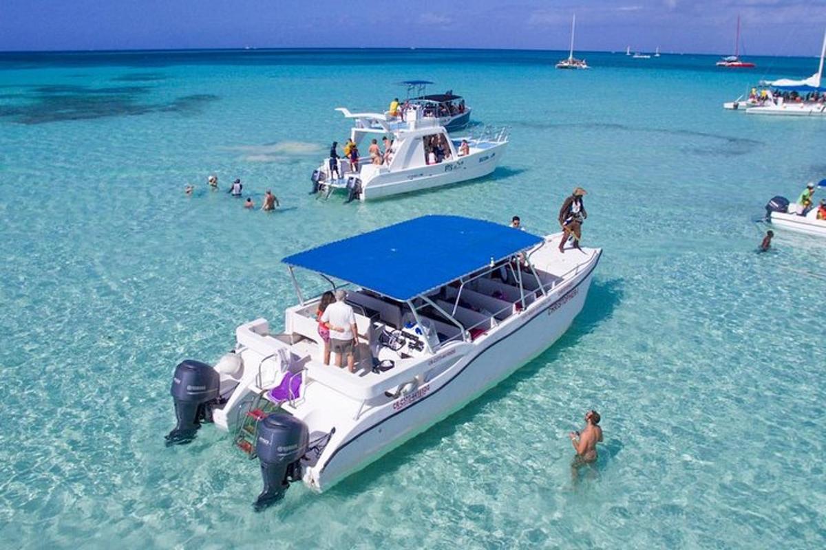 a group of people on a boat in the water